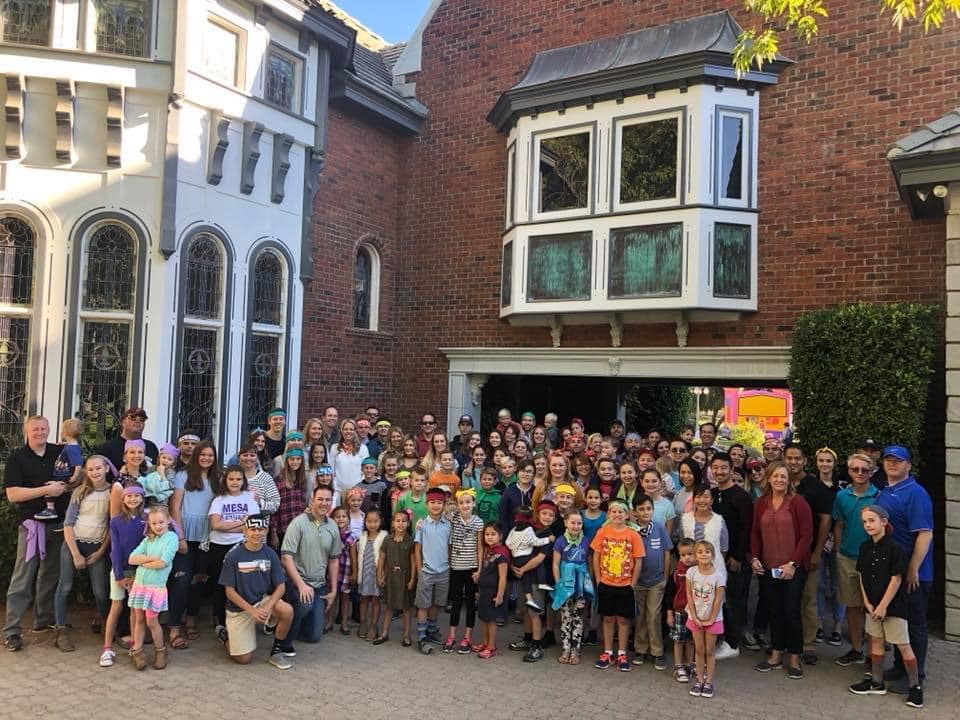 Volunteers and children gathered at The Lavender Farm at Chateau de Vie for Kid Connection Thanksgiving